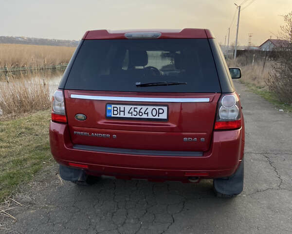 Червоний Ленд Ровер Freelander, об'ємом двигуна 2.2 л та пробігом 170 тис. км за 13300 $, фото 8 на Automoto.ua
