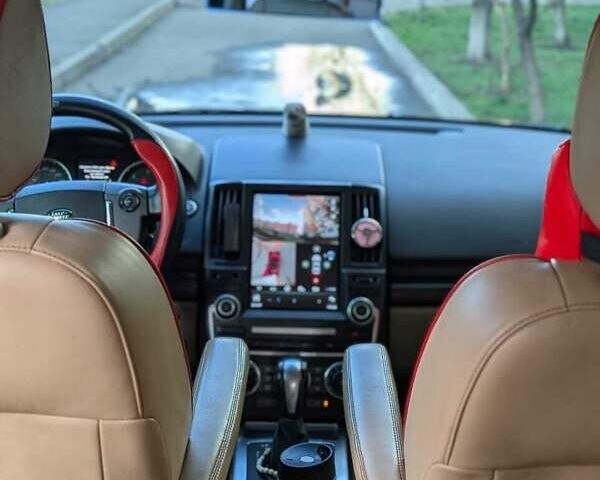 Червоний Ленд Ровер Freelander, об'ємом двигуна 2.18 л та пробігом 201 тис. км за 19000 $, фото 5 на Automoto.ua