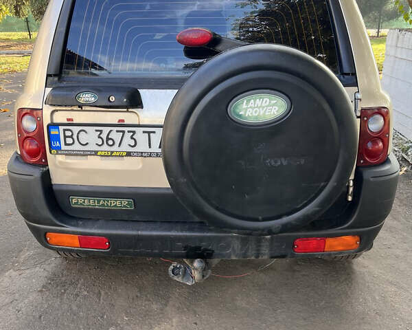 Желтый Ленд Ровер Фрилендер, объемом двигателя 1.8 л и пробегом 245 тыс. км за 3900 $, фото 7 на Automoto.ua