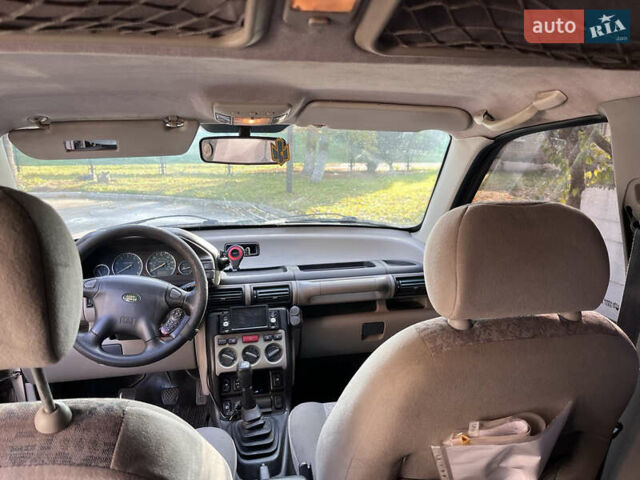 Желтый Ленд Ровер Фрилендер, объемом двигателя 1.8 л и пробегом 245 тыс. км за 3900 $, фото 5 на Automoto.ua