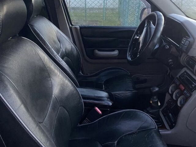 Серый Ленд Ровер Фрилендер, объемом двигателя 1.8 л и пробегом 238 тыс. км за 5000 $, фото 4 на Automoto.ua