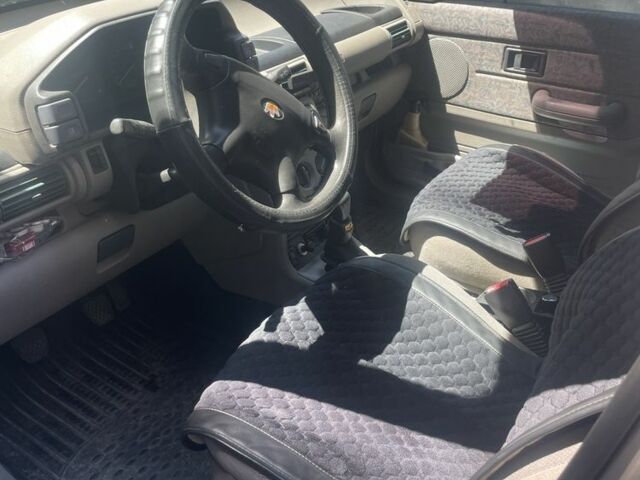 Сірий Ленд Ровер Freelander, об'ємом двигуна 2 л та пробігом 350 тис. км за 2500 $, фото 2 на Automoto.ua