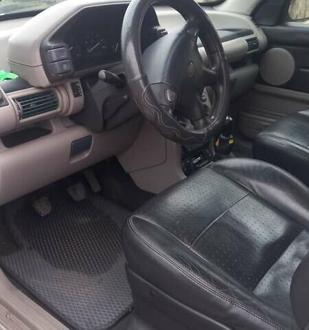 Серый Ленд Ровер Фрилендер, объемом двигателя 1.95 л и пробегом 230 тыс. км за 4800 $, фото 4 на Automoto.ua