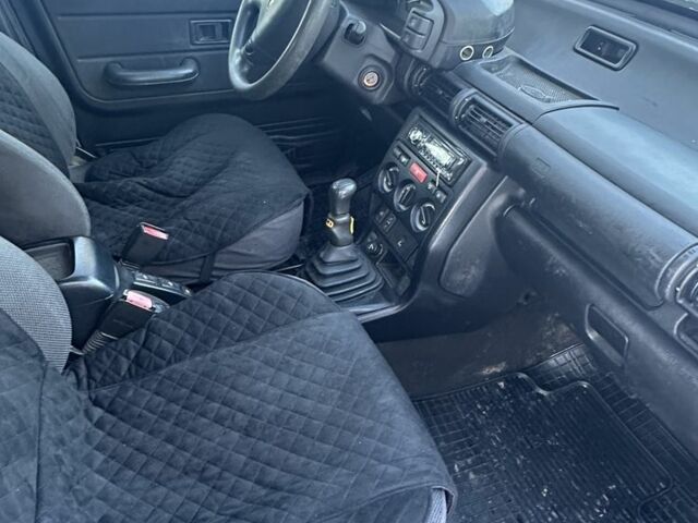 Сірий Ленд Ровер Freelander, об'ємом двигуна 2 л та пробігом 392 тис. км за 3200 $, фото 4 на Automoto.ua