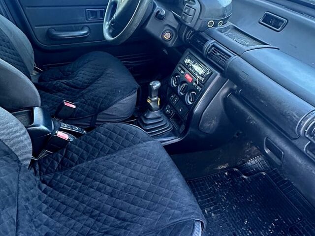 Серый Ленд Ровер Фрилендер, объемом двигателя 2 л и пробегом 380 тыс. км за 2800 $, фото 7 на Automoto.ua