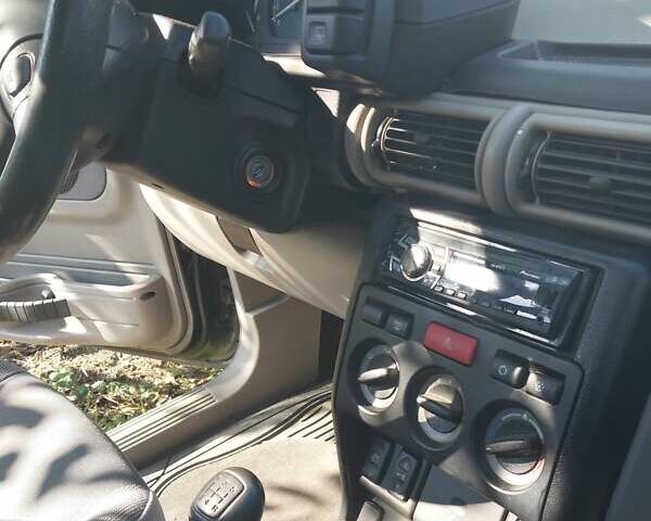 Серый Ленд Ровер Фрилендер, объемом двигателя 1.8 л и пробегом 137 тыс. км за 4000 $, фото 4 на Automoto.ua