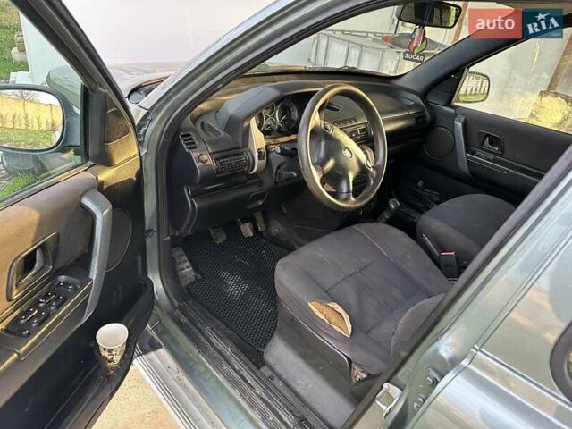 Сірий Ленд Ровер Freelander, об'ємом двигуна 1.95 л та пробігом 150 тис. км за 6800 $, фото 6 на Automoto.ua