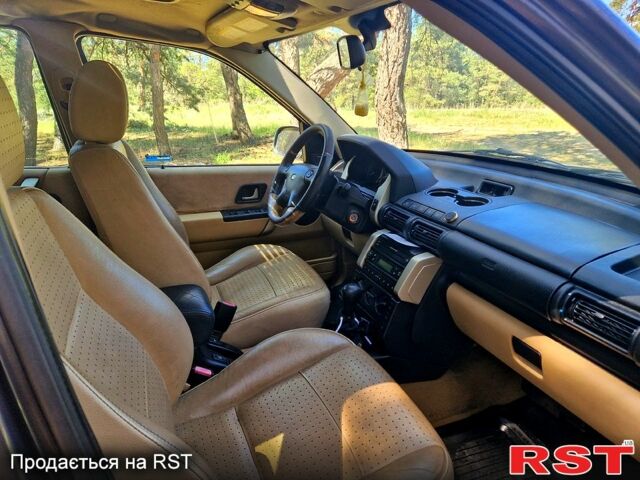 Серый Ленд Ровер Фрилендер, объемом двигателя 2.5 л и пробегом 86 тыс. км за 3500 $, фото 4 на Automoto.ua