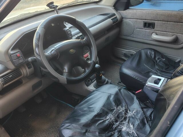 Синий Ленд Ровер Фрилендер, объемом двигателя 1.8 л и пробегом 400 тыс. км за 2000 $, фото 5 на Automoto.ua