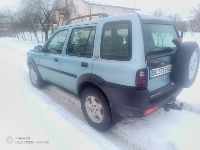 Синий Ленд Ровер Фрилендер, объемом двигателя 1.8 л и пробегом 230 тыс. км за 4000 $, фото 2 на Automoto.ua