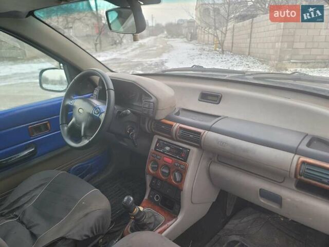 Синій Ленд Ровер Freelander, об'ємом двигуна 1.8 л та пробігом 164 тис. км за 4600 $, фото 11 на Automoto.ua