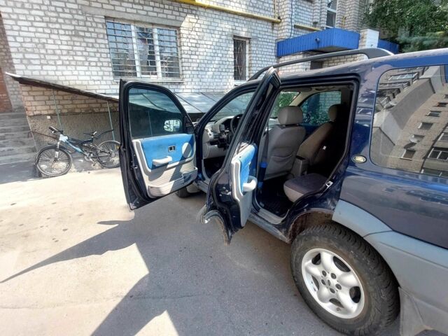 Синій Ленд Ровер Freelander, об'ємом двигуна 1.8 л та пробігом 260 тис. км за 4062 $, фото 7 на Automoto.ua