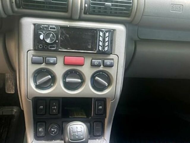 Синий Ленд Ровер Фрилендер, объемом двигателя 1.8 л и пробегом 200 тыс. км за 4500 $, фото 3 на Automoto.ua