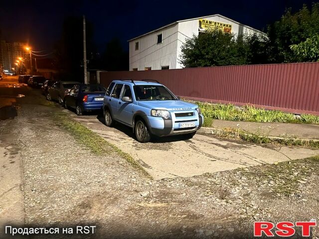 Синий Ленд Ровер Фрилендер, объемом двигателя 1.8 л и пробегом 142 тыс. км за 5700 $, фото 4 на Automoto.ua