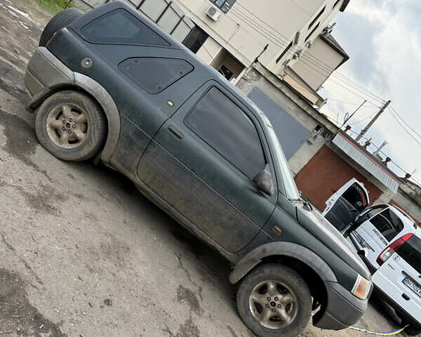 Зеленый Ленд Ровер Фрилендер, объемом двигателя 1.99 л и пробегом 250 тыс. км за 2699 $, фото 4 на Automoto.ua