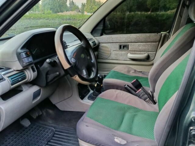 Зеленый Ленд Ровер Фрилендер, объемом двигателя 1.8 л и пробегом 300 тыс. км за 3500 $, фото 7 на Automoto.ua