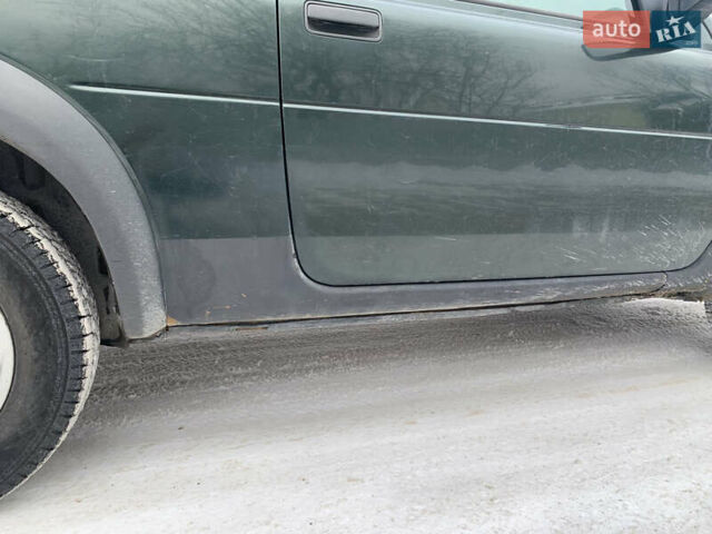 Зеленый Ленд Ровер Фрилендер, объемом двигателя 1.95 л и пробегом 310 тыс. км за 4800 $, фото 6 на Automoto.ua