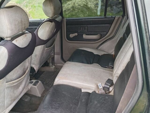 Зелений Ленд Ровер Freelander, об'ємом двигуна 1.99 л та пробігом 285 тис. км за 4400 $, фото 9 на Automoto.ua