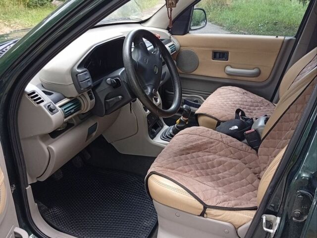 Зелений Ленд Ровер Freelander, об'ємом двигуна 1.8 л та пробігом 231 тис. км за 4500 $, фото 9 на Automoto.ua