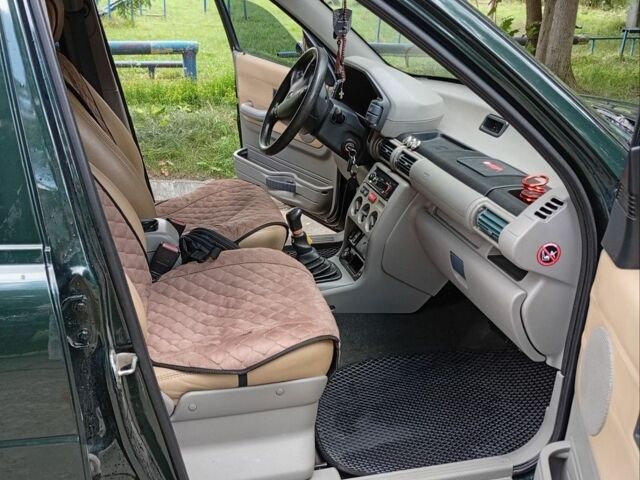 Зелений Ленд Ровер Freelander, об'ємом двигуна 1.8 л та пробігом 231 тис. км за 4500 $, фото 12 на Automoto.ua