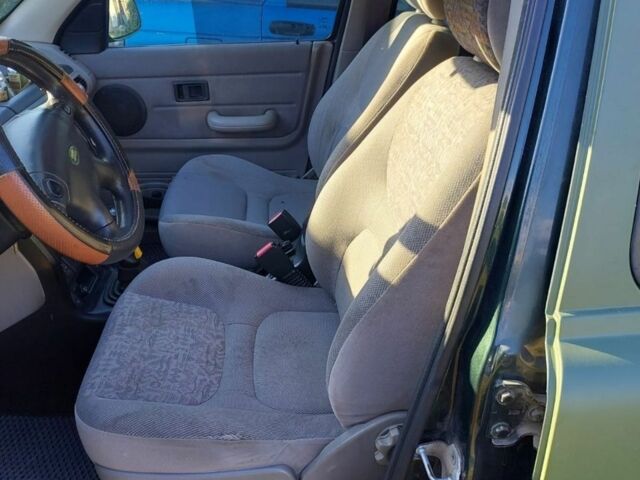 Зелений Ленд Ровер Freelander, об'ємом двигуна 2 л та пробігом 425 тис. км за 3100 $, фото 5 на Automoto.ua