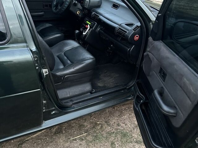 Зелений Ленд Ровер Freelander, об'ємом двигуна 2 л та пробігом 321 тис. км за 2550 $, фото 10 на Automoto.ua