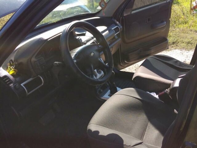 Зелений Ленд Ровер Freelander, об'ємом двигуна 2 л та пробігом 346 тис. км за 6500 $, фото 5 на Automoto.ua
