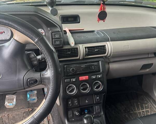 Зелений Ленд Ровер Freelander, об'ємом двигуна 2 л та пробігом 250 тис. км за 5300 $, фото 11 на Automoto.ua