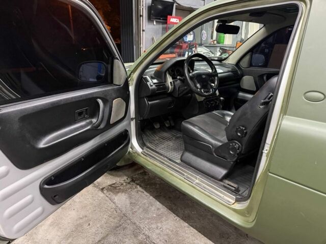 Зеленый Ленд Ровер Фрилендер, объемом двигателя 2 л и пробегом 291 тыс. км за 3000 $, фото 5 на Automoto.ua