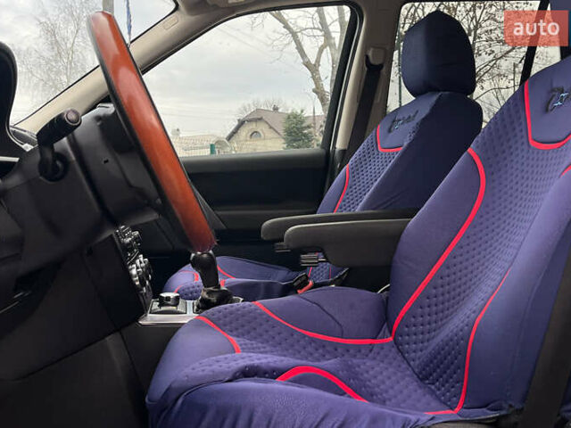 Зелений Ленд Ровер Freelander, об'ємом двигуна 2.18 л та пробігом 230 тис. км за 13600 $, фото 8 на Automoto.ua