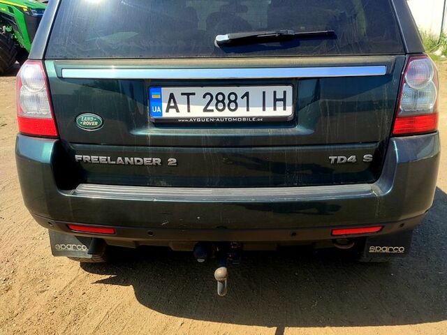 Зелений Ленд Ровер Freelander, об'ємом двигуна 2.2 л та пробігом 220 тис. км за 13500 $, фото 2 на Automoto.ua