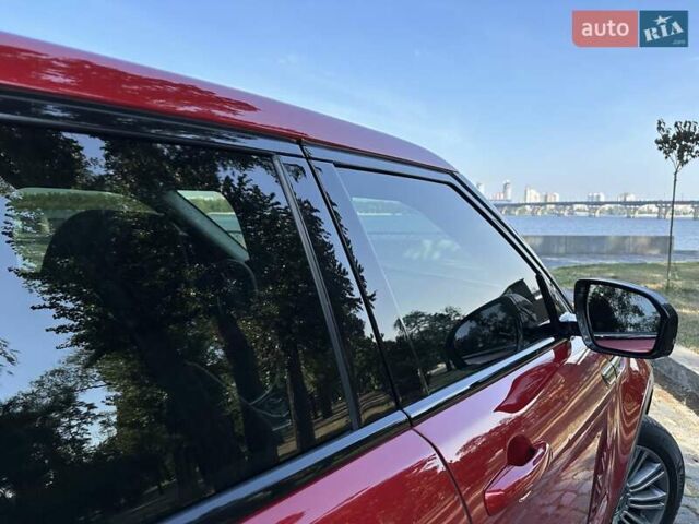 Красный Ленд Ровер Рендж Ровер Эвок, объемом двигателя 2.18 л и пробегом 139 тыс. км за 19777 $, фото 1 на Automoto.ua