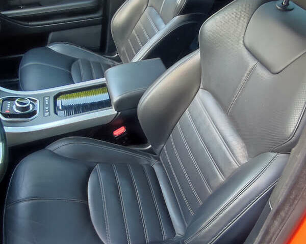 Помаранчевий Ленд Ровер Рендж Ровер Евок, об'ємом двигуна 2 л та пробігом 90 тис. км за 25950 $, фото 14 на Automoto.ua