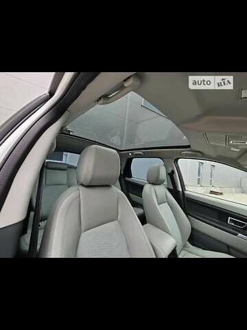 Білий Ленд Ровер Discovery Sport, об'ємом двигуна 2 л та пробігом 155 тис. км за 19000 $, фото 12 на Automoto.ua