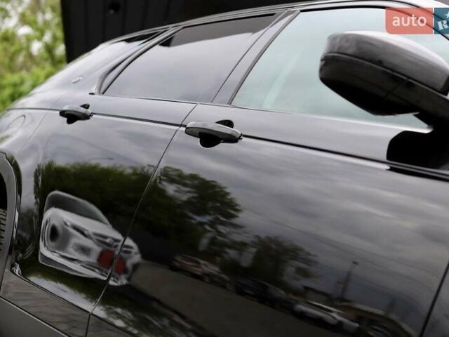 Черный Ленд Ровер Discovery Sport, объемом двигателя 2 л и пробегом 142 тыс. км за 23899 $, фото 57 на Automoto.ua