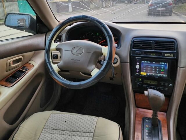 Бежевий Лексус ЕС, об'ємом двигуна 3 л та пробігом 239 тис. км за 806 $, фото 3 на Automoto.ua