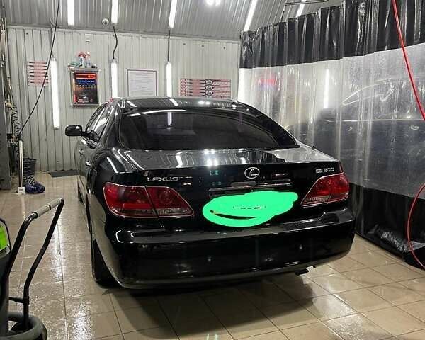 Черный Лексус ЕС, объемом двигателя 3 л и пробегом 217 тыс. км за 8909 $, фото 1 на Automoto.ua