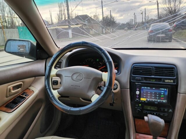 Серый Лексус ЕС, объемом двигателя 3 л и пробегом 290 тыс. км за 1150 $, фото 8 на Automoto.ua