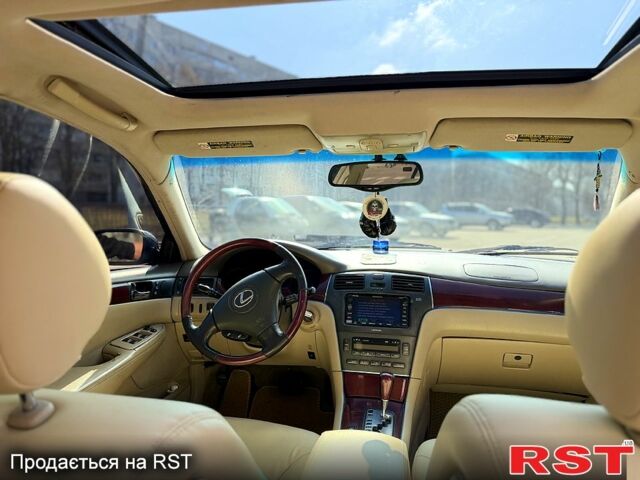 Синий Лексус ЕС, объемом двигателя 3 л и пробегом 310 тыс. км за 4100 $, фото 6 на Automoto.ua