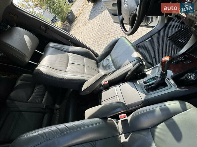 Белый Лексус ГХ, объемом двигателя 4.66 л и пробегом 261 тыс. км за 17400 $, фото 16 на Automoto.ua