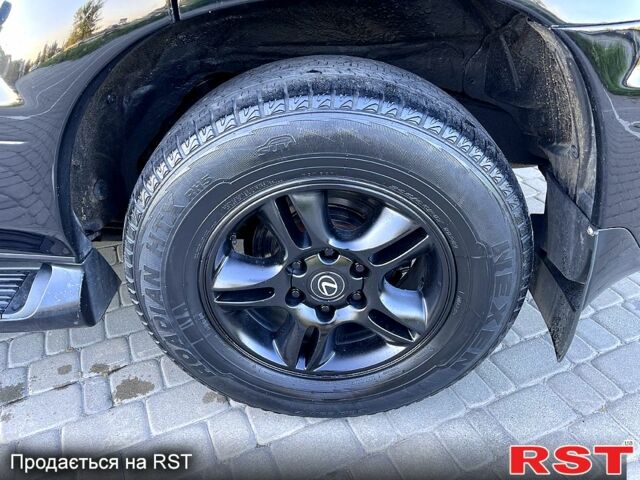 Черный Лексус ГХ, объемом двигателя 4.7 л и пробегом 296 тыс. км за 11700 $, фото 3 на Automoto.ua