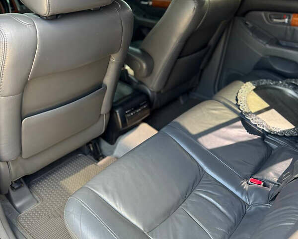 Черный Лексус ГХ, объемом двигателя 4.66 л и пробегом 245 тыс. км за 14200 $, фото 11 на Automoto.ua