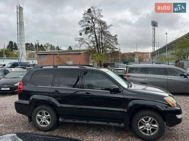 Черный Лексус ГХ, объемом двигателя 4.66 л и пробегом 223 тыс. км за 12700 $, фото 3 на Automoto.ua