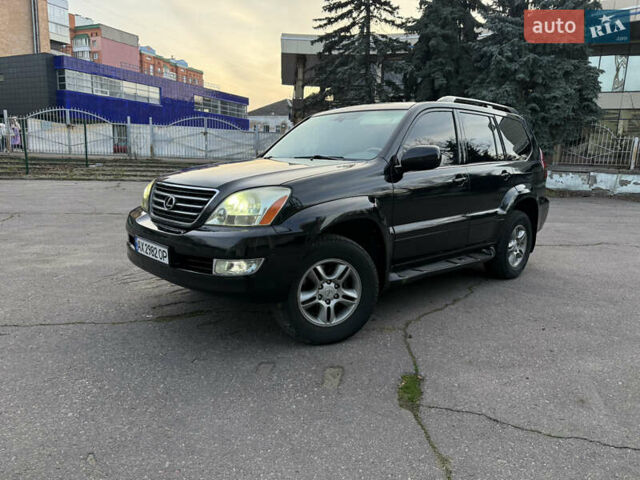 Черный Лексус ГХ, объемом двигателя 4.66 л и пробегом 225 тыс. км за 11900 $, фото 1 на Automoto.ua