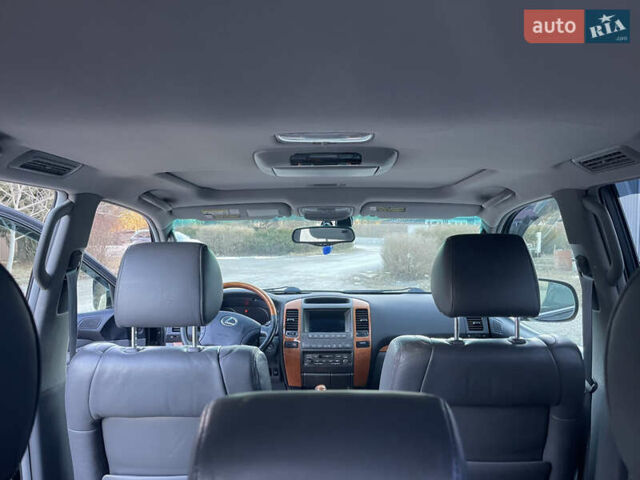 Черный Лексус ГХ, объемом двигателя 4.66 л и пробегом 237 тыс. км за 16200 $, фото 20 на Automoto.ua