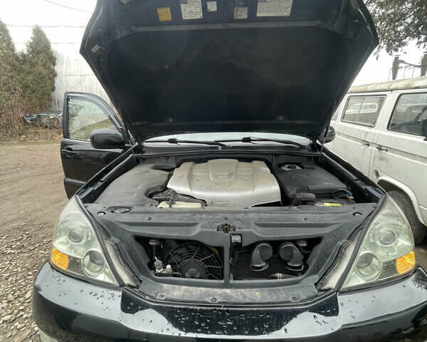 Черный Лексус ГХ, объемом двигателя 4.66 л и пробегом 237 тыс. км за 16200 $, фото 24 на Automoto.ua