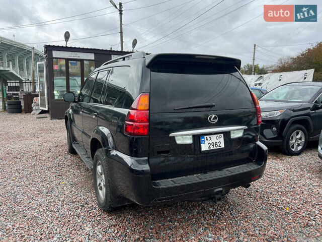 Черный Лексус ГХ, объемом двигателя 4.66 л и пробегом 223 тыс. км за 12700 $, фото 4 на Automoto.ua