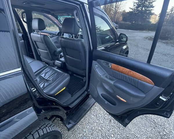 Черный Лексус ГХ, объемом двигателя 4.66 л и пробегом 237 тыс. км за 16200 $, фото 22 на Automoto.ua