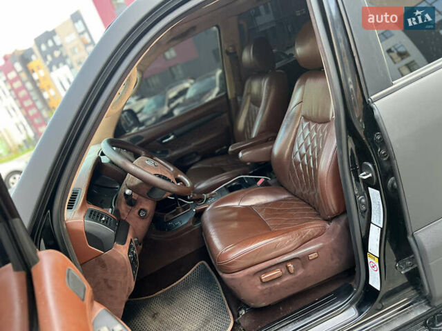 Черный Лексус ГХ, объемом двигателя 4.7 л и пробегом 269 тыс. км за 9400 $, фото 22 на Automoto.ua