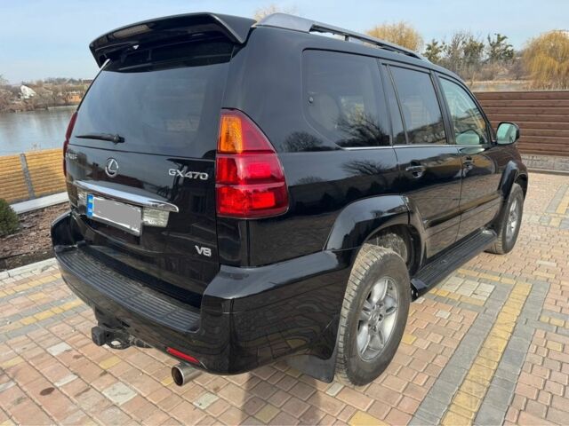 Черный Лексус ГХ, объемом двигателя 4.7 л и пробегом 300 тыс. км за 15300 $, фото 4 на Automoto.ua
